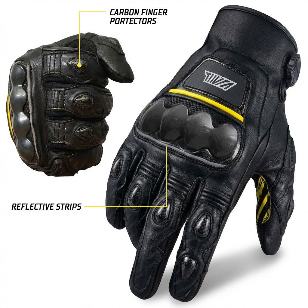 Black motorcycle glove with carbon finger protectors and reflective strips, on a white background.